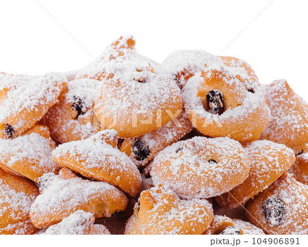 Christmas cookies with powdered sugar on plate 104906891