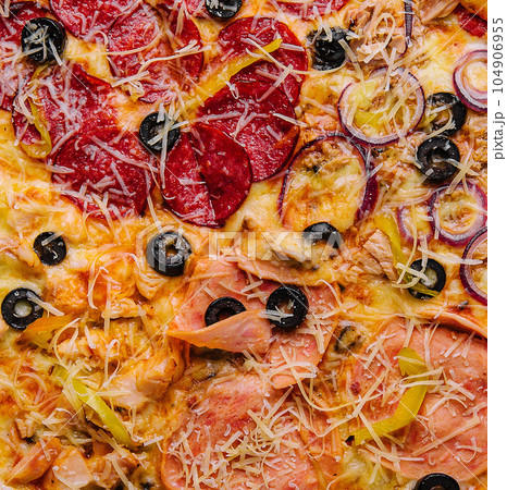 composition with slices of different delicious pizzas 104906955