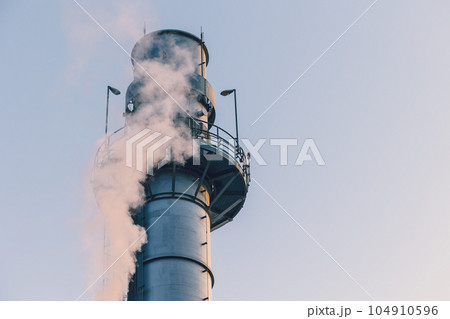 Power station clean modern factory Petroleum petrochemical industry building outdoors landscape with large chimney releasing smoke. 104910596