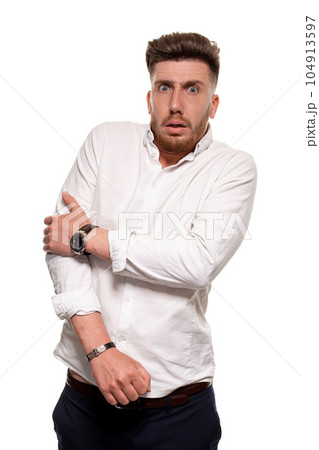 Studio photo of a good-looking man in a white shirt, isolated over a white background 104913597