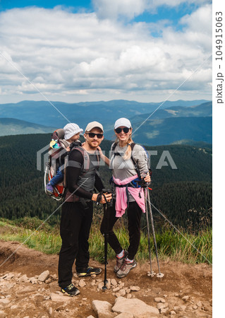 A family with a baby in the mountains 104915063