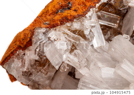 Macro mineral stone crystals Hemimorphite rock on a white background 104915475