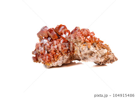 Macro mineral stone Vanadinite on a white background Macro mineral stone Vanadinite on a white background 104915486