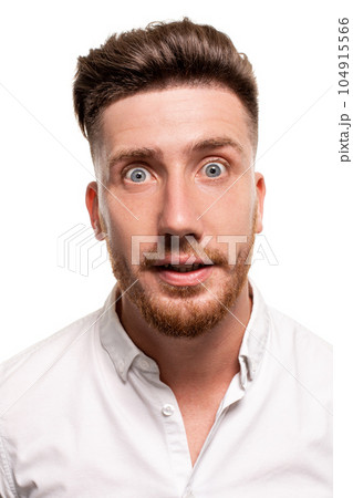 Studio photo of a good-looking man in a white shirt, isolated over a white background 104915566