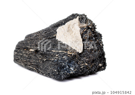 Macro mineral stone Schorl, Black Tourmaline on a white background 104915842