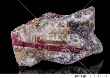 macro mineral tourmaline stone on black background 104915874