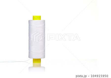 a skein of thread white colors macro on a white background a skein of thread white colors macro on a white background 104915950