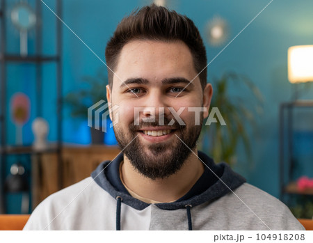 Happy calm man smiling friendly, glad expression, feel satisfied concept good news, celebrate win 104918208