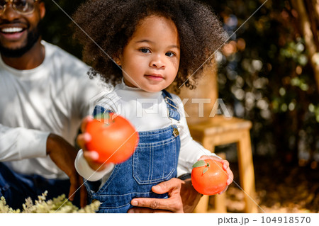 Happy family spending time together at home Happy family spending time together at home 104918570