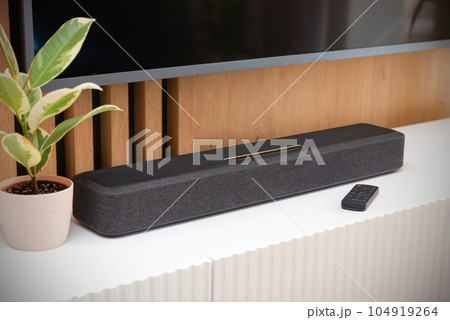 Soundbar in a modern home. Listening to music 104919264