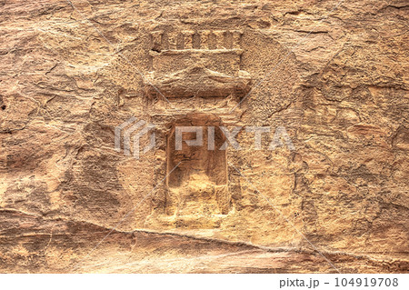 View of a wall with a man-made sandstone window. Petra, Jordan View of a wall with a man-made sandstone window. Petra, Jordan 104919708