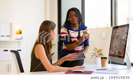 Marketing accounting team meeting and working together at company 104919830