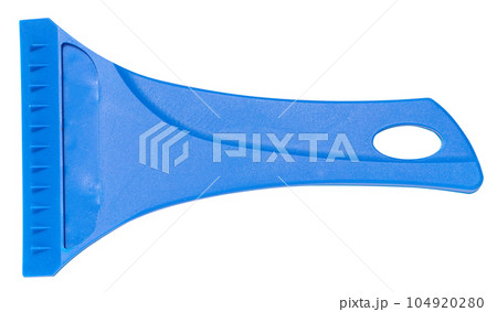 lue plastic scraper for household use on a white isolated background, top view lue plastic scraper for household use on a white isolated background, top view 104920280