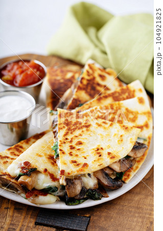 Mushroom and cheese quesadillas 104921825