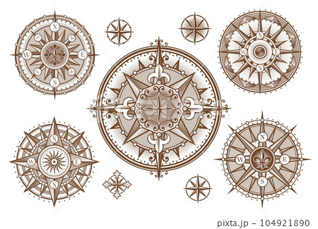 Vintage medieval antique wind rose compass engravings with sun and stars. Vector ancient compass woodcuts with ornate arrows of North, East, West, South directions, victorian fleur-de-lis and scrolls 104921890