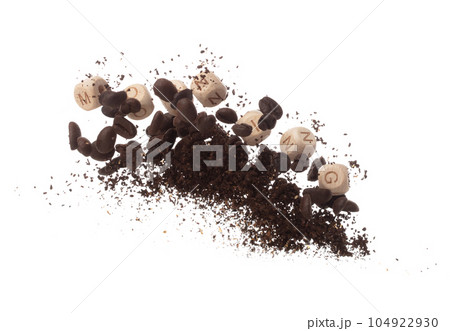 Rich aroma freshly roasted coffee beans fly in air as dance alongside alphabet letter blocks toy beads "MORNING", embodying essence of the coffee seed powder. White background isolated explosion Rich aroma freshly roasted coffee beans fly in air as dance alongside alphabet letter blocks toy beads "MORNING", embodying essence of the coffee seed powder. White background isolated explosion 104922930
