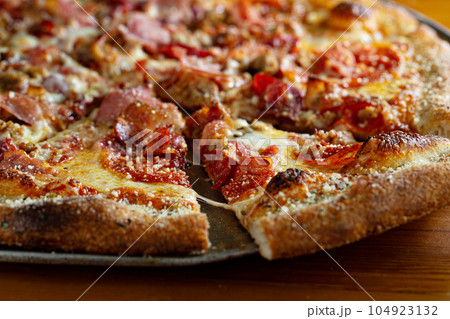 Pepperoni and ham pizza 104923132