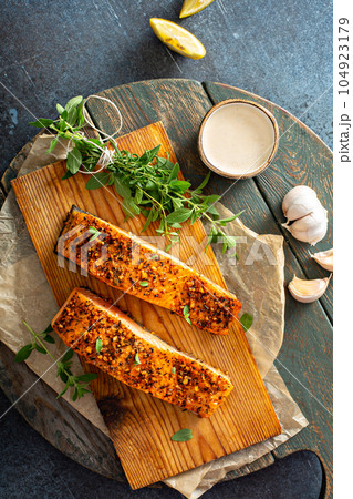 Cedar plank roasted salmon 104923179