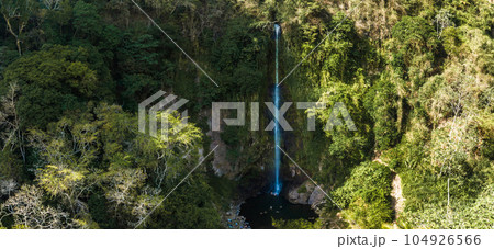 La Fortuna Waterfall in Costa Rica. The waterfall is located on the Arenal River at the base of the dormant Chato volcano. Long exposure. La Fortuna Waterfall in Costa Rica. The waterfall is located on the Arenal River at the base of the dormant Chato volcano. Long exposure. 104926566