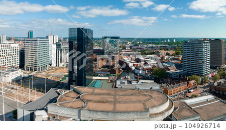Aerial view of the eBirmingham city center. Beautiful English city, with modern skyscrapers and traditional architecture. Aerial view of the eBirmingham city center. Beautiful English city, with modern skyscrapers and traditional architecture. 104926714