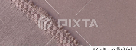 Back and face sides of grey-pink textile close up. 104928813