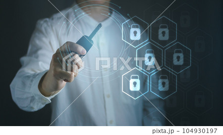 Business man holding key on his hand, online cyber security lock concept. 104930197