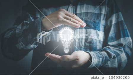 Futuristic light bulb for new idea concept with innovation and inspiration, Futuristic light bulb for new idea concept with innovation and inspiration, 104930200