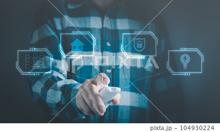 Man with remote control on smart home applications, concept of digitalization. Man with remote control on smart home applications, concept of digitalization. 104930224