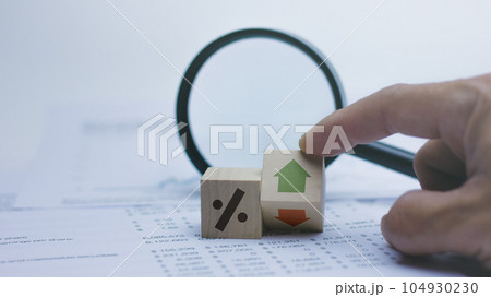 Financial concept to analysing business progress with magnifying glass on background. 104930230