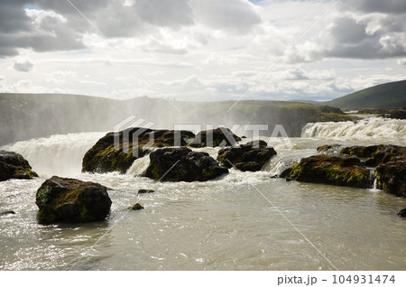 Breathtaking view of a beautiful Godafoss waterfall in Iceland Breathtaking view of a beautiful Godafoss waterfall in Iceland 104931474