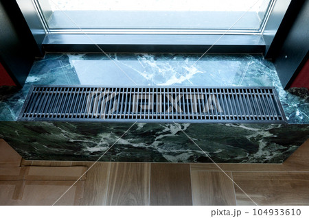 Windowsill, heating grid ventilation. 104933610