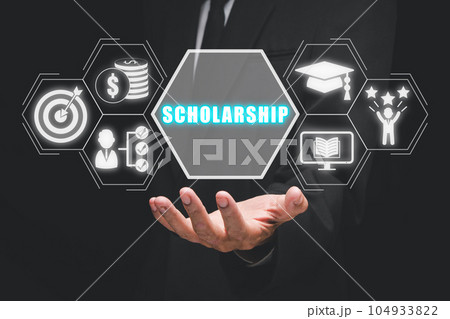 Scholarship concept, Person hand holding scholarship icon on virtual screen. Scholarship concept, Person hand holding scholarship icon on virtual screen. 104933822