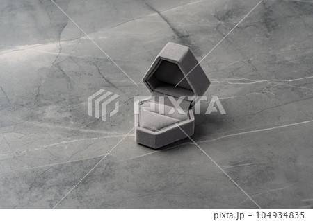 Small jewelry box on gray background close up 104934835