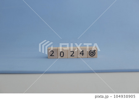 Abstract for business targen in the year 2024. Blue background. 104938905