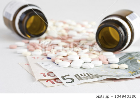 pills and money 104940380