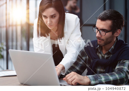 working together in a meeting in the office, teamwork concept 104940872