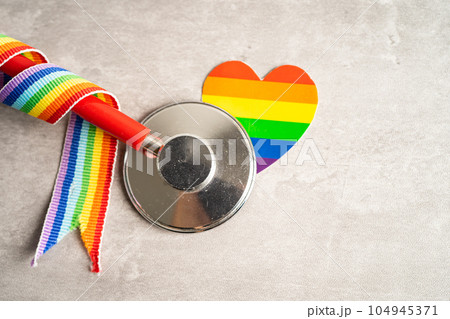 Stethoscope with heart and rainbow flag, symbol of LGBT pride month celebrate annual in June social, symbol of gay, lesbian, bisexual, transgender, human rights and peace. 104945371