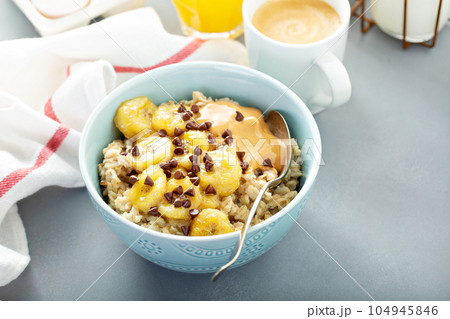 Oatmeal with caramelized bananas Oatmeal with caramelized bananas 104945846