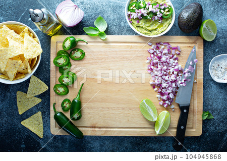 Making guacamole 104945868