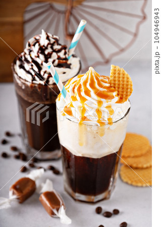 Coffee cocktails with whipped cream 104946943