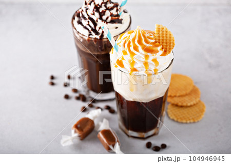 Coffee cocktails with whipped cream 104946945