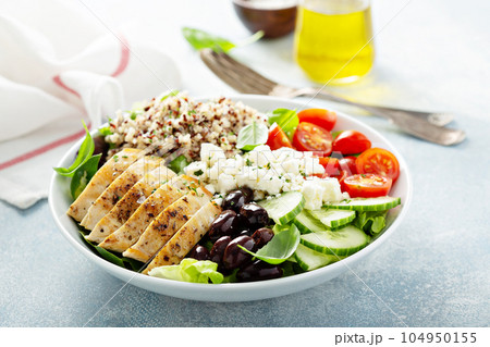 Greek inspired lunch bowl with chicken and quinoa 104950155
