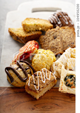 Variety of small pastries for breakfast 104950200