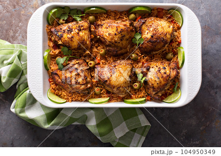 Arroz con pollo in a baking dish 104950349