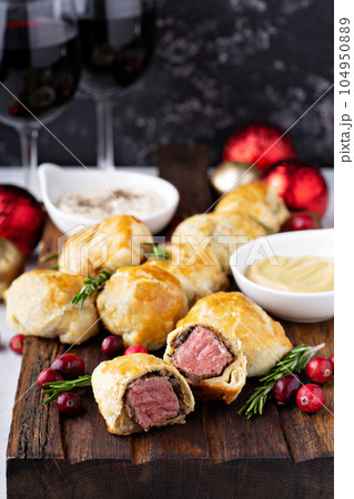 Bite size Beef Wellingtons 104950889