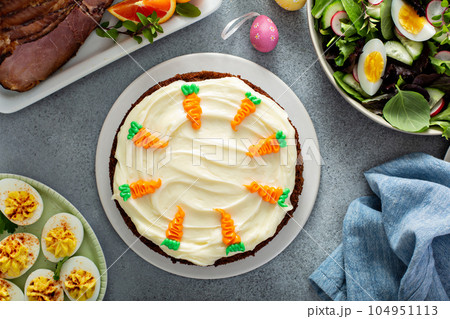 Carrot cake with cream cheese frosting 104951113