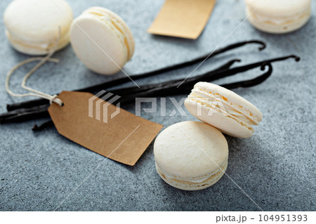 Vanilla macarons on a gray surface 104951393