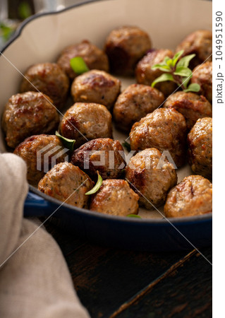 Swedish meatballs in a cast iron pan 104951590