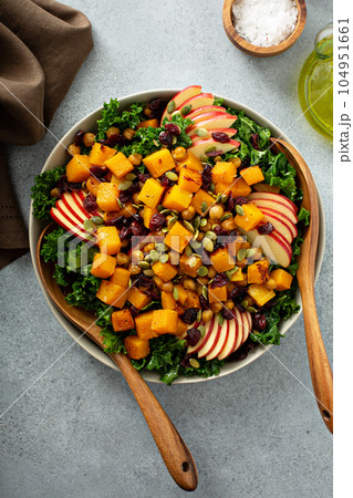 Winter or fall salad with kale and butternut squash 104951661