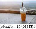 iced coffee on wood table 104953551